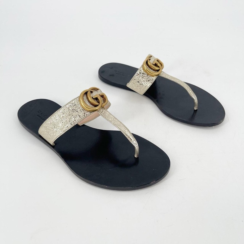 Gucci Women's Gold and Black Sandals